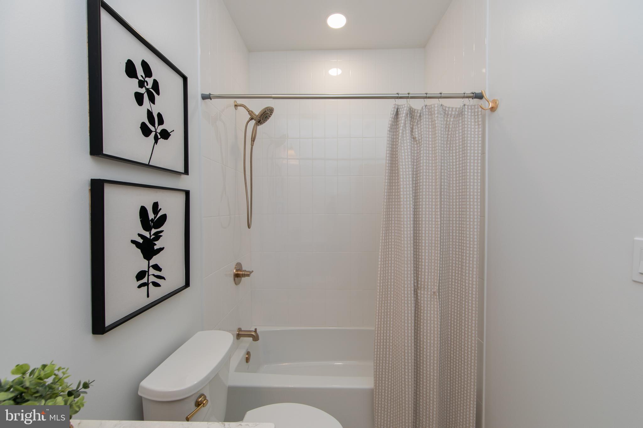 371 Kresson Road Cherry Hill, NJ 08034 - Photo 45 of 51 a bathroom with a shower curtain and a sink
