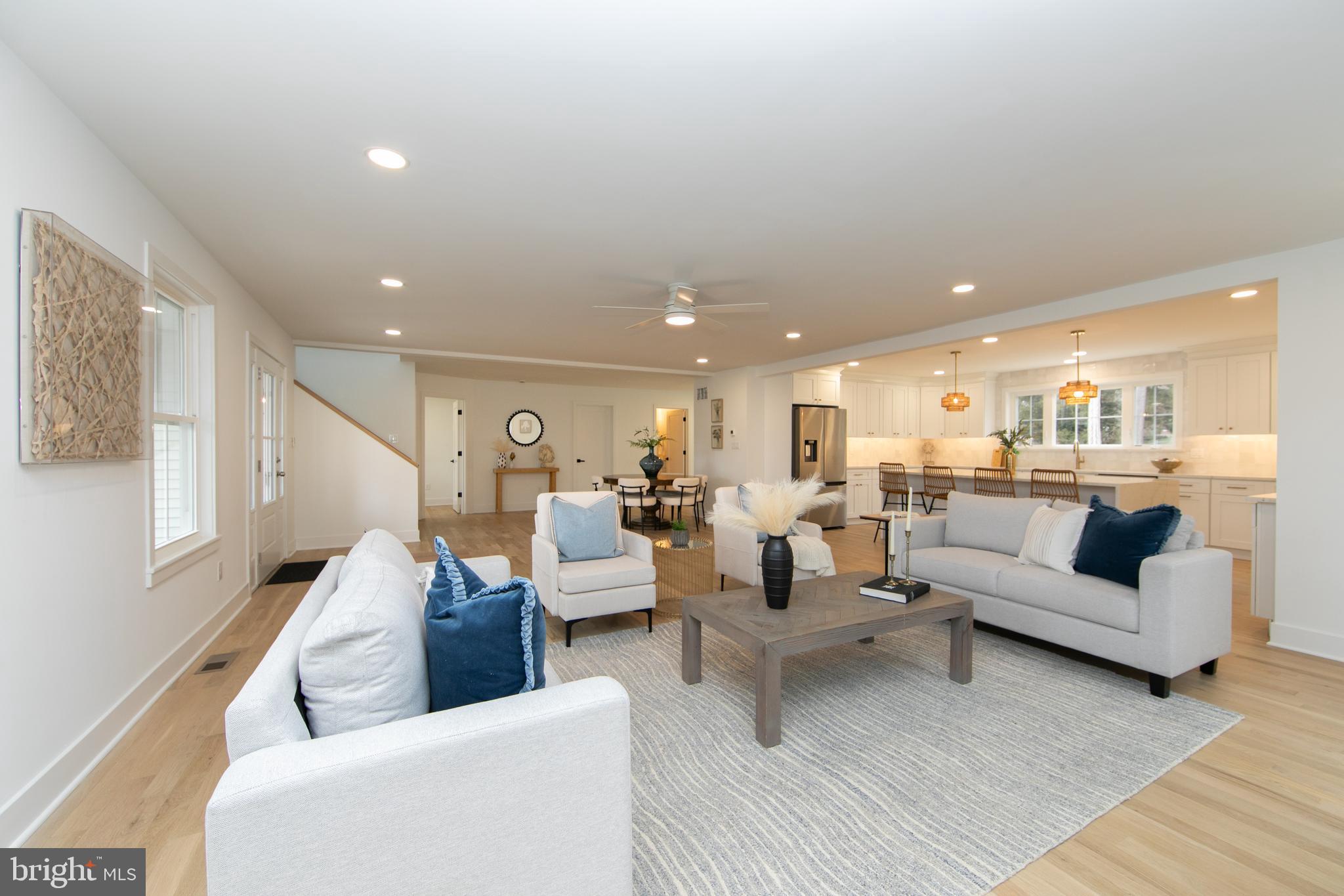 371 Kresson Road Cherry Hill, NJ 08034 - Photo 5 of 51 a living room with couches and kitchen view with wooden floor