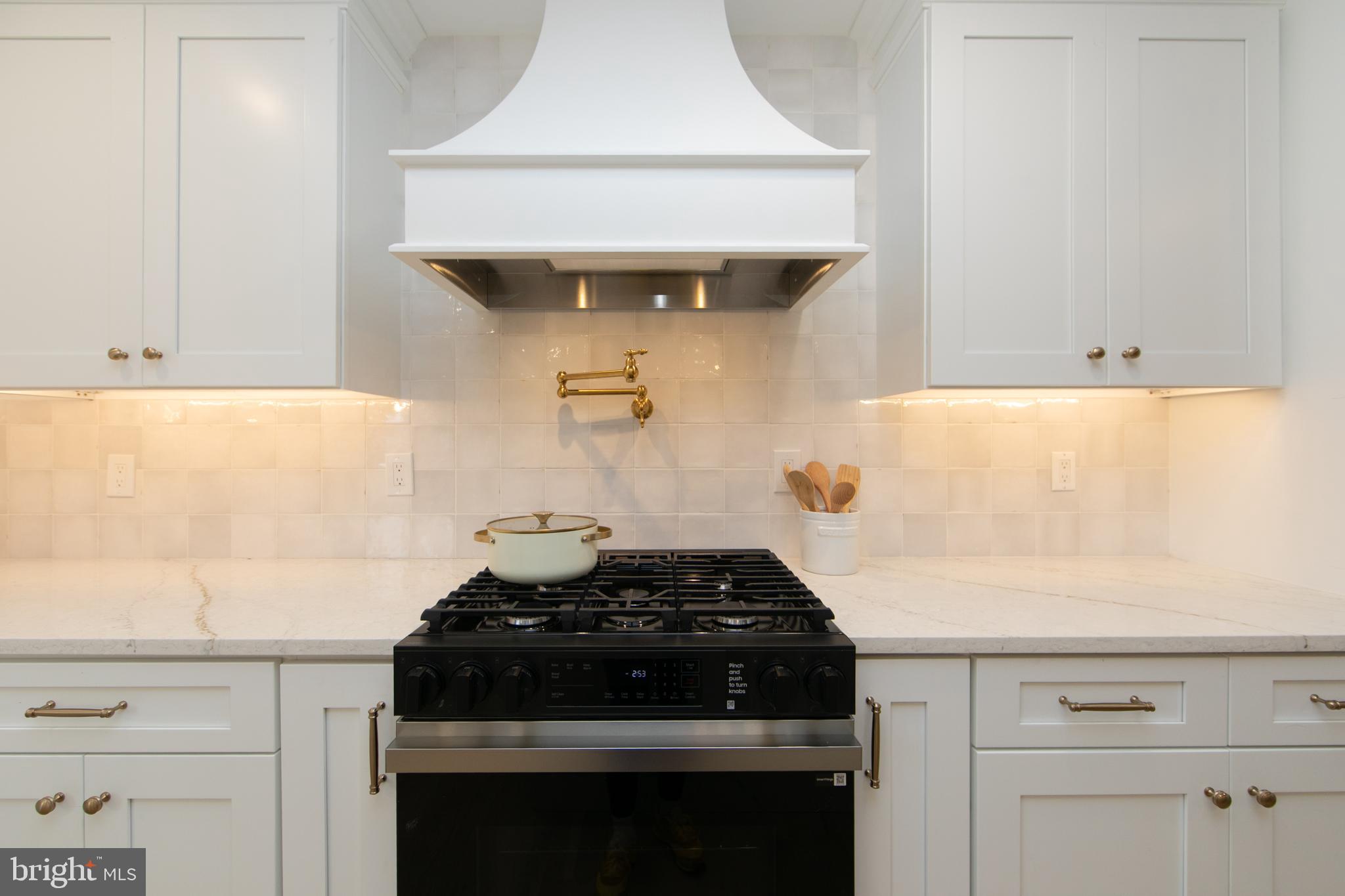 371 Kresson Road Cherry Hill, NJ 08034 - Photo 10 of 51 a close view of a stove a microwave and cabinets