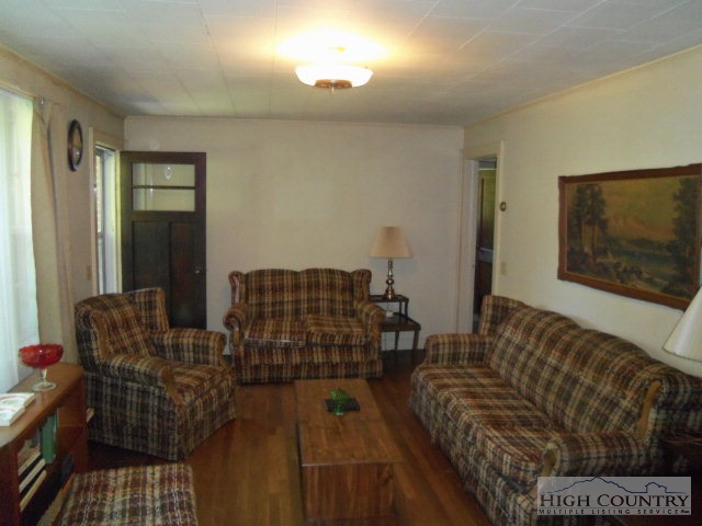 128 Jake Blackburn Road Lansing, NC 28643 - Photo 10 of 16 a living room with furniture