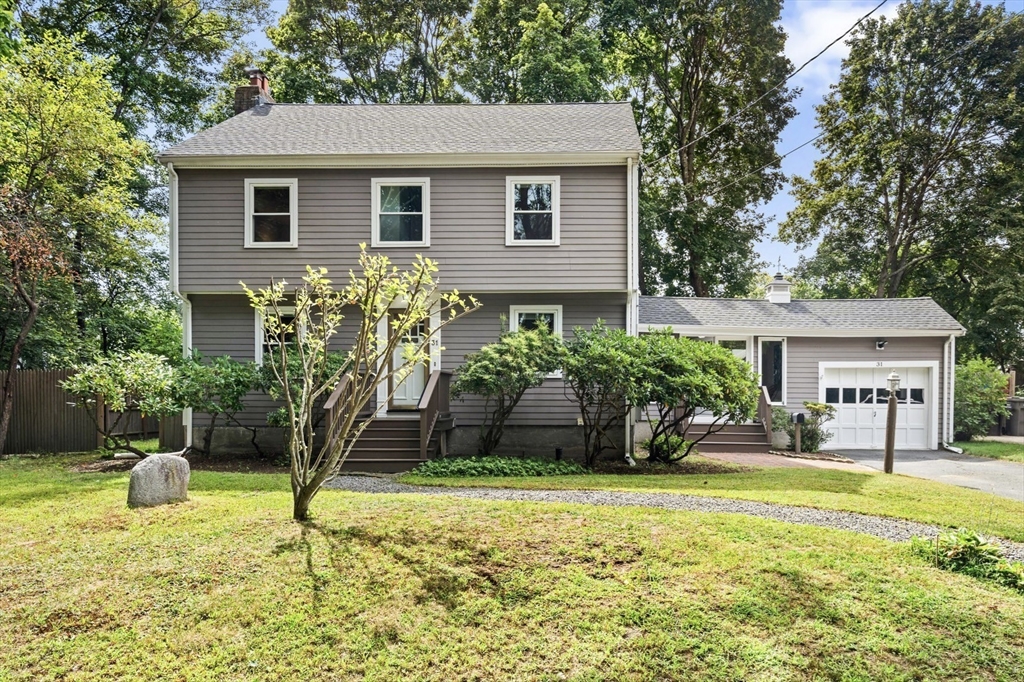 31 Palmer Road Framingham, MA 01702 - Photo 1 of 1 a house view with a garden space