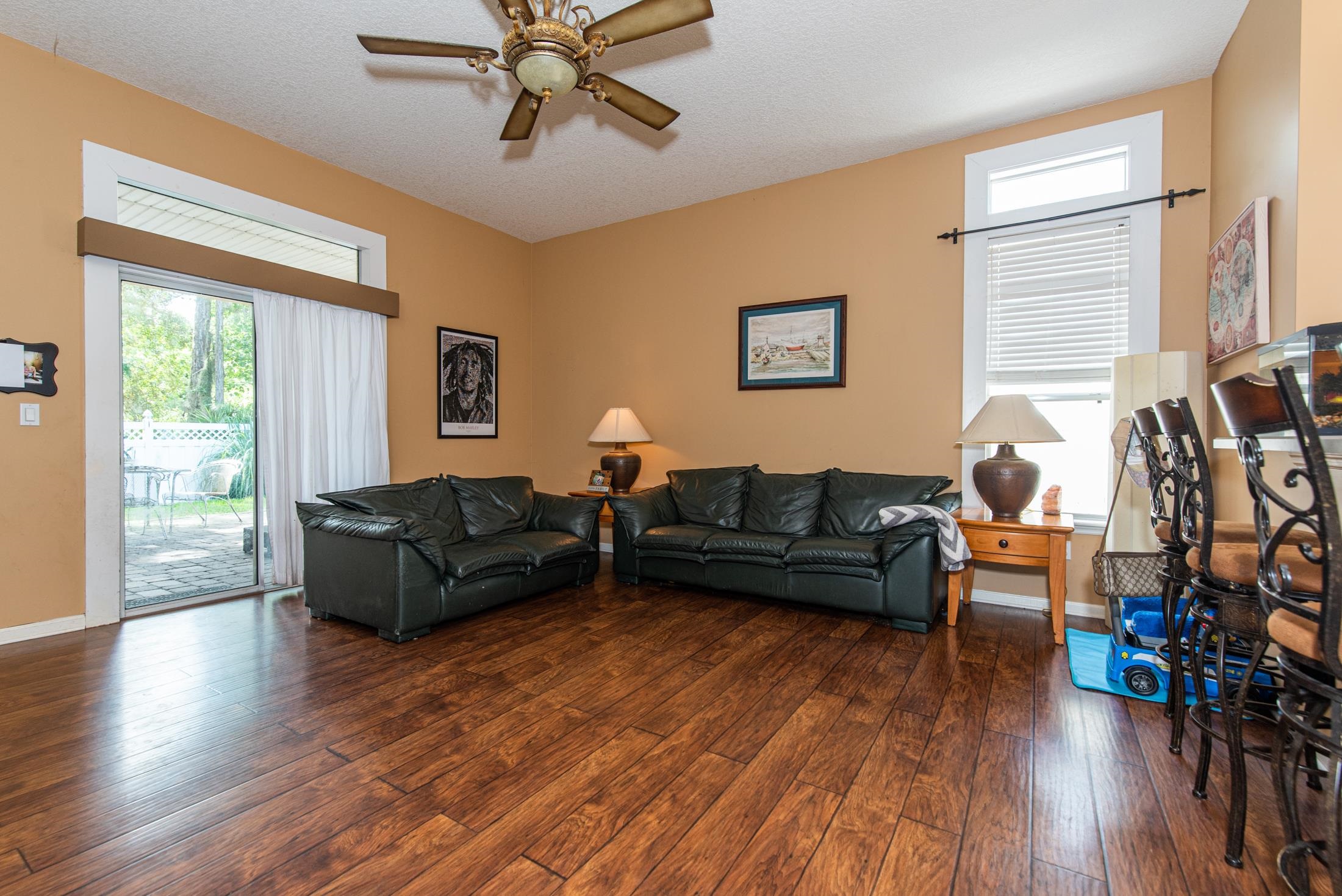 1809 Keswick Road St. Augustine, FL 32084 - Photo 12 of 39 a living room with furniture and a wooden floor