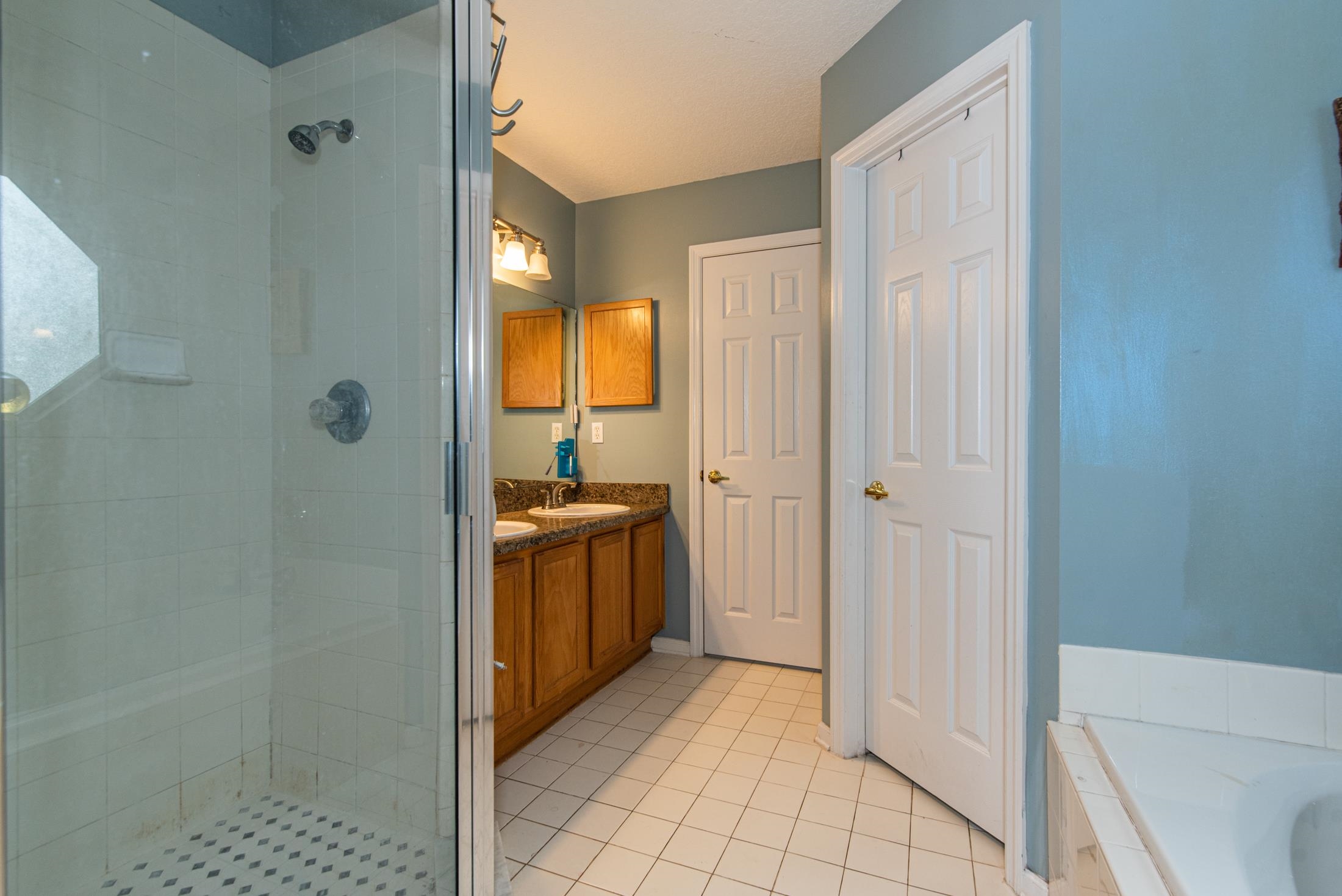 1809 Keswick Road St. Augustine, FL 32084 - Photo 16 of 39 a bathroom with a sink and a mirror