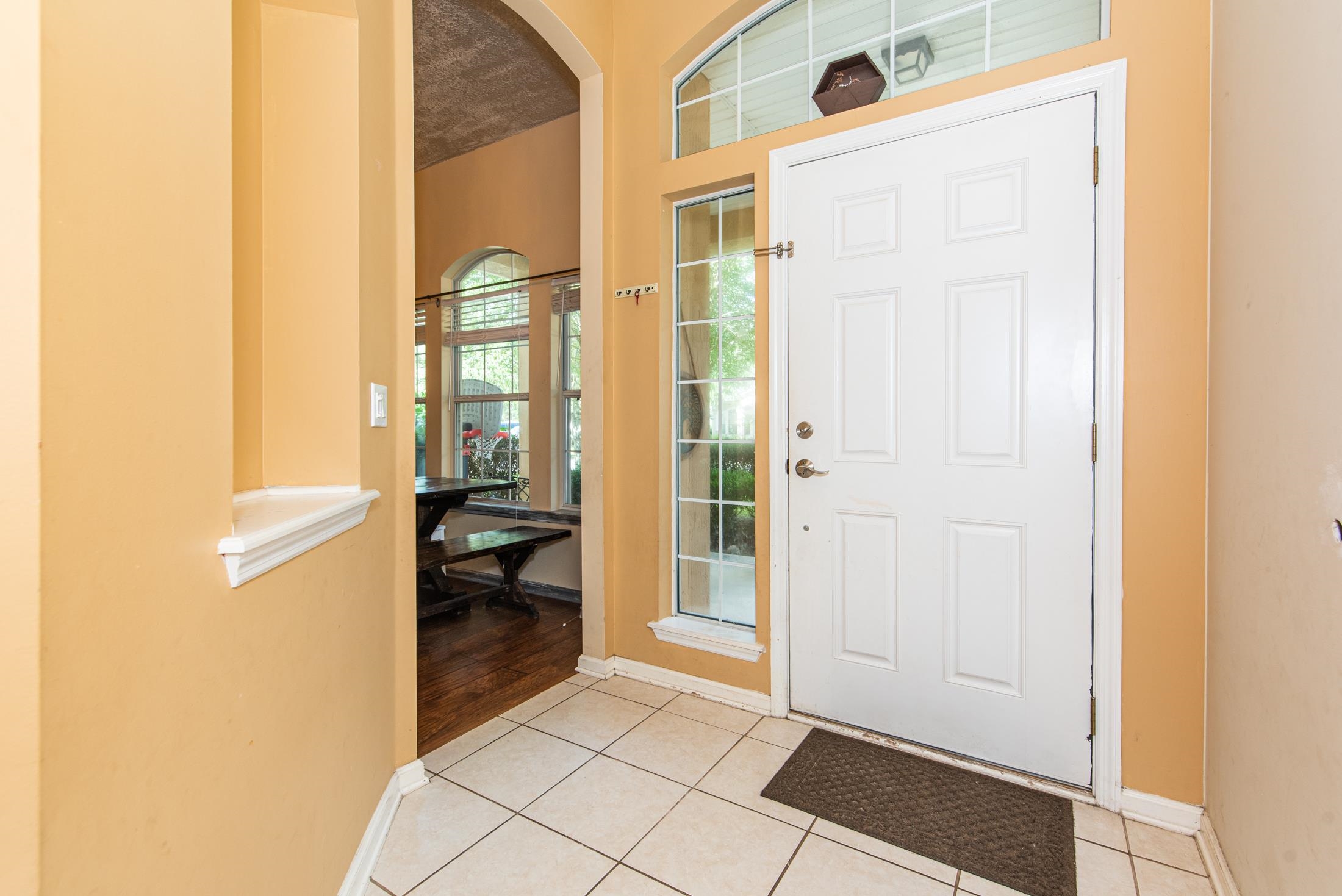 1809 Keswick Road St. Augustine, FL 32084 - Photo 3 of 39 a bathroom with a glass door shower and a mirror