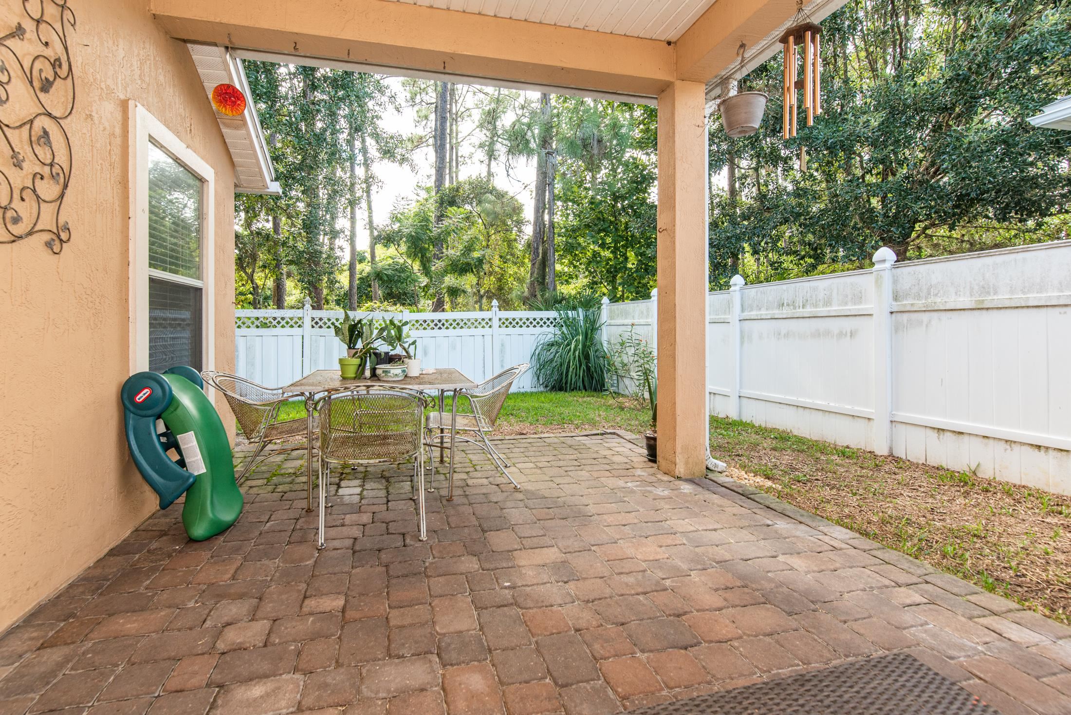 1809 Keswick Road St. Augustine, FL 32084 - Photo 25 of 39 a garden view with a outdoor seating space