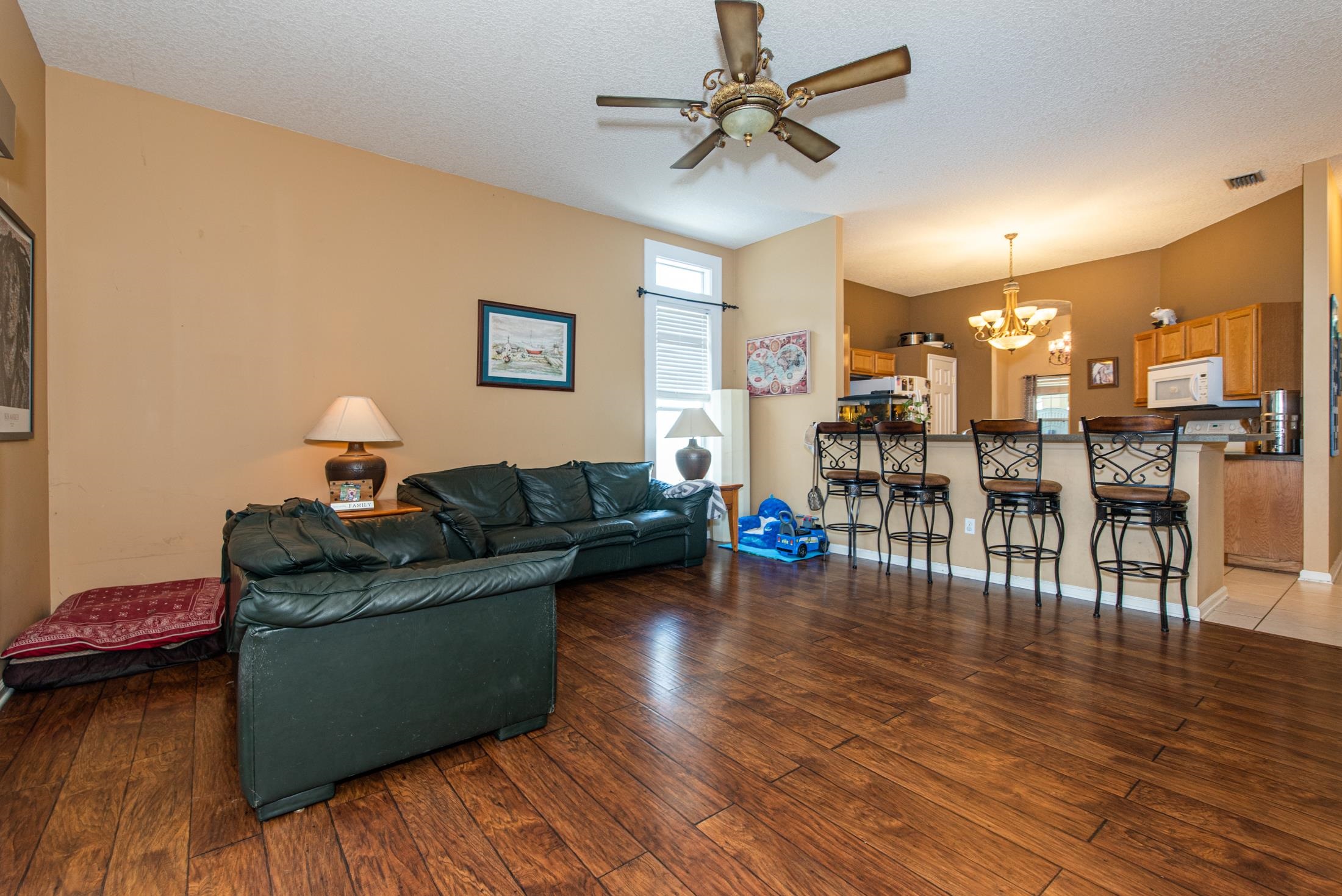 1809 Keswick Road St. Augustine, FL 32084 - Photo 10 of 39 a living room with furniture and wooden floor