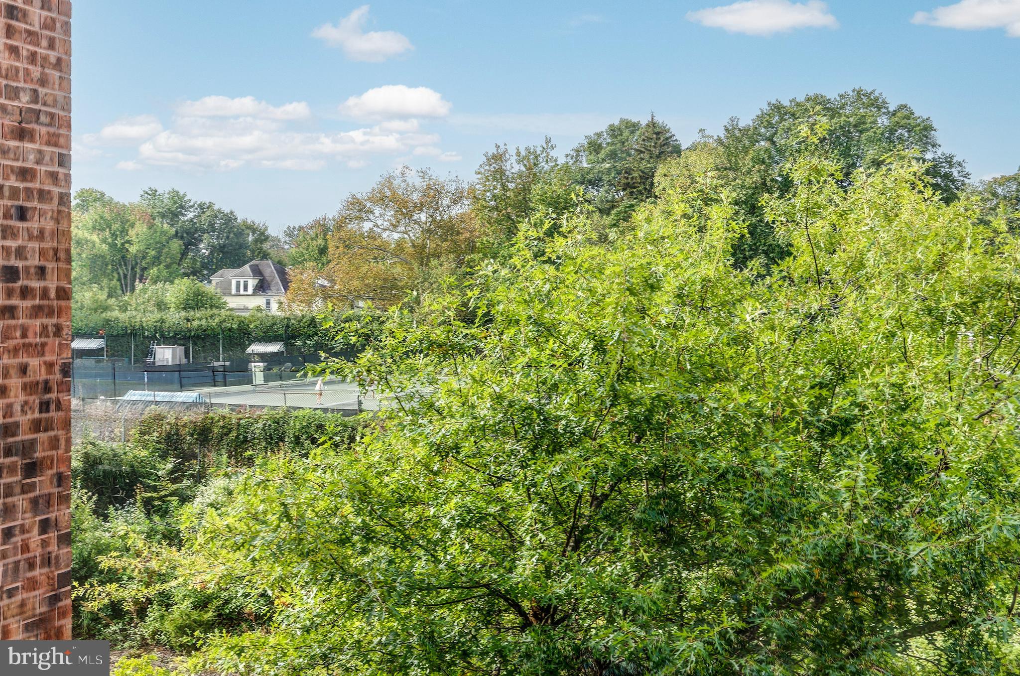 209 Haddonfield Commons, Unit 209 Haddonfield, NJ 08033 - Photo 20 of 21 a view of a garden from a building