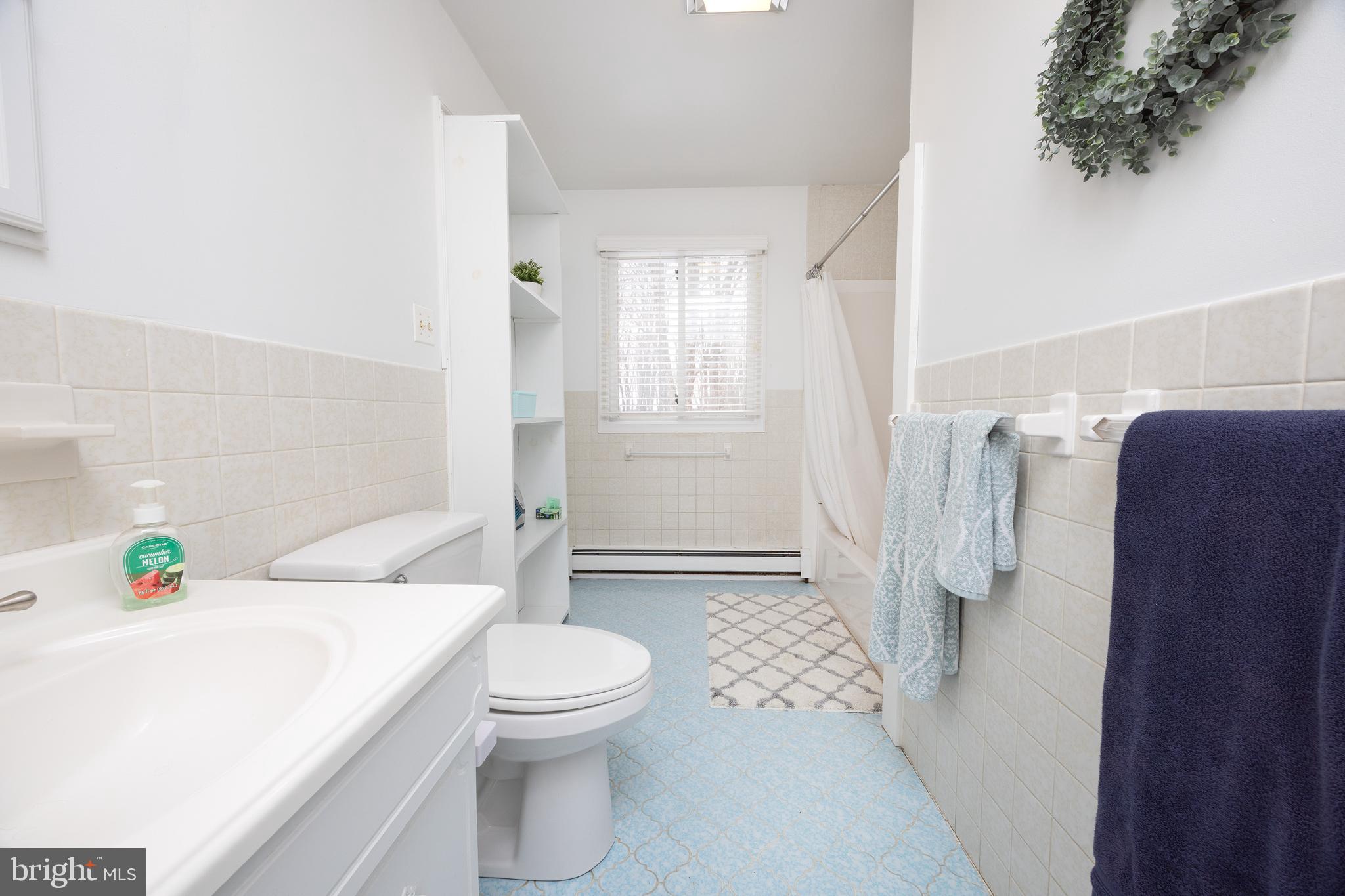 6106 Lower York Road New Hope, PA 18938 - Photo 16 of 20 a bathroom with a sink a toilet and shower