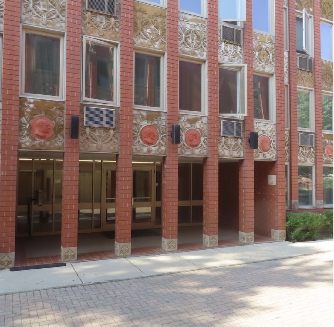 a front view of a multi story building