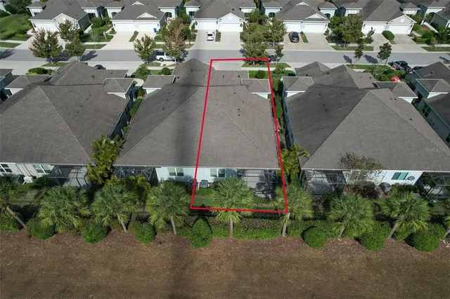 a view of a livingroom with furniture and windows
