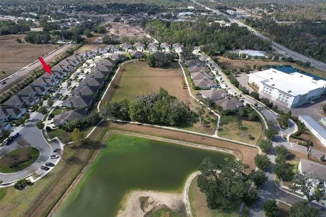 a view of an empty room with bathroom and a bathroom