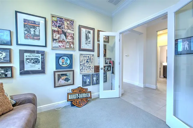a kitchen with kitchen island cabinets and refrigerator