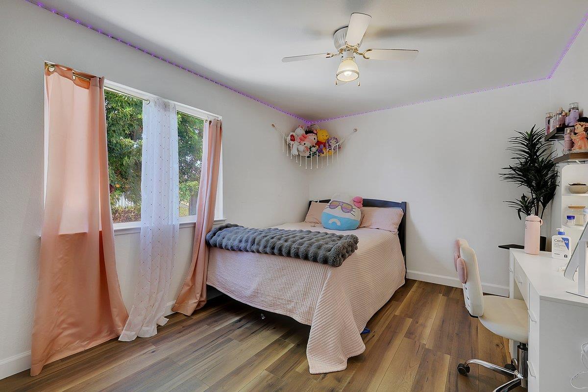 10307 Alta Mesa Road Wilton, CA 95693 - Photo 23 of 58 a living room with furniture and a chandelier