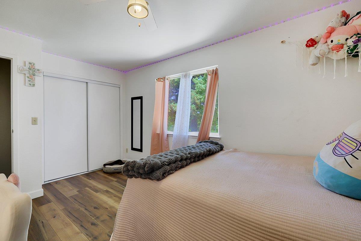 10307 Alta Mesa Road Wilton, CA 95693 - Photo 24 of 58 a bedroom with a bed and a window