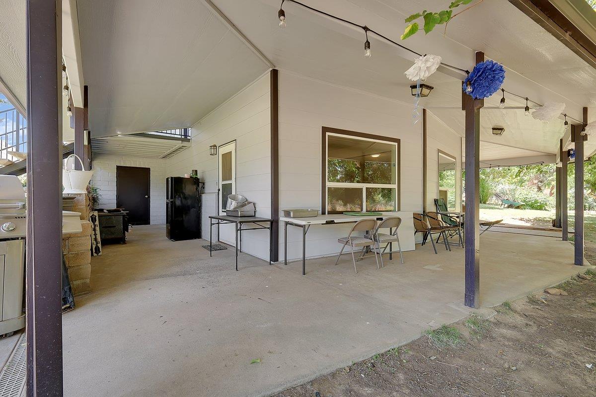 10307 Alta Mesa Road Wilton, CA 95693 - Photo 27 of 58 a view of a livingroom with furniture and windows