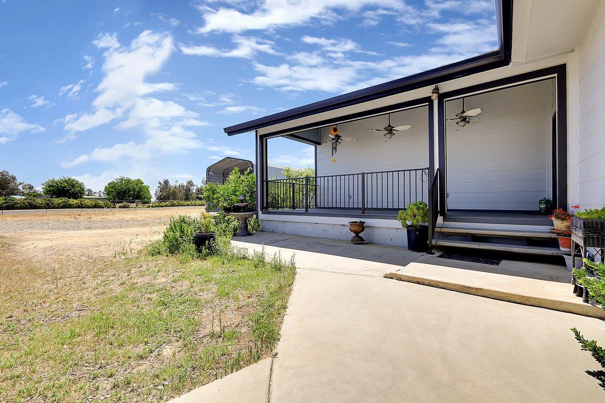10307 Alta Mesa Road Wilton, CA 95693 - Photo 39 of 58 a view of swimming pool with outdoor seating and plants