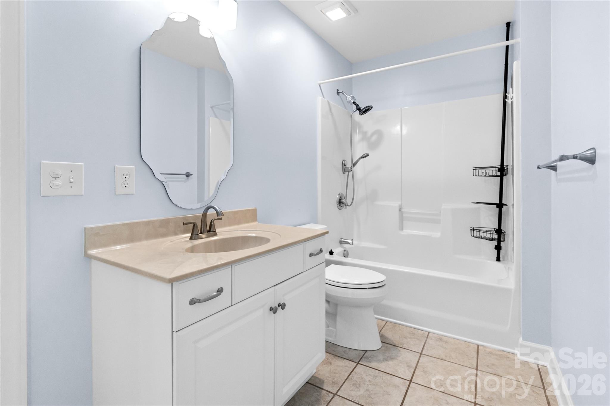 321 Forbes Court Clover, SC 29710 - Photo 21 of 31 a bathroom with a granite countertop sink a toilet and shower