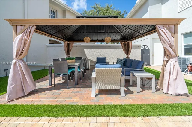 a view of yard with outdoor seating