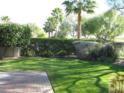 304 Loch Lomond Road Rancho Mirage, CA 92270 - Photo 17 of 17 a backyard of a house with lots of green space