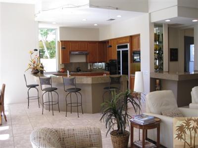 304 Loch Lomond Road Rancho Mirage, CA 92270 - Photo 8 of 17 a view of a dining room with furniture