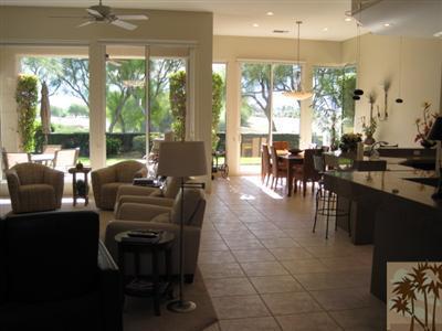 304 Loch Lomond Road Rancho Mirage, CA 92270 - Photo 10 of 17 a view of a dining room with furniture window and outside view
