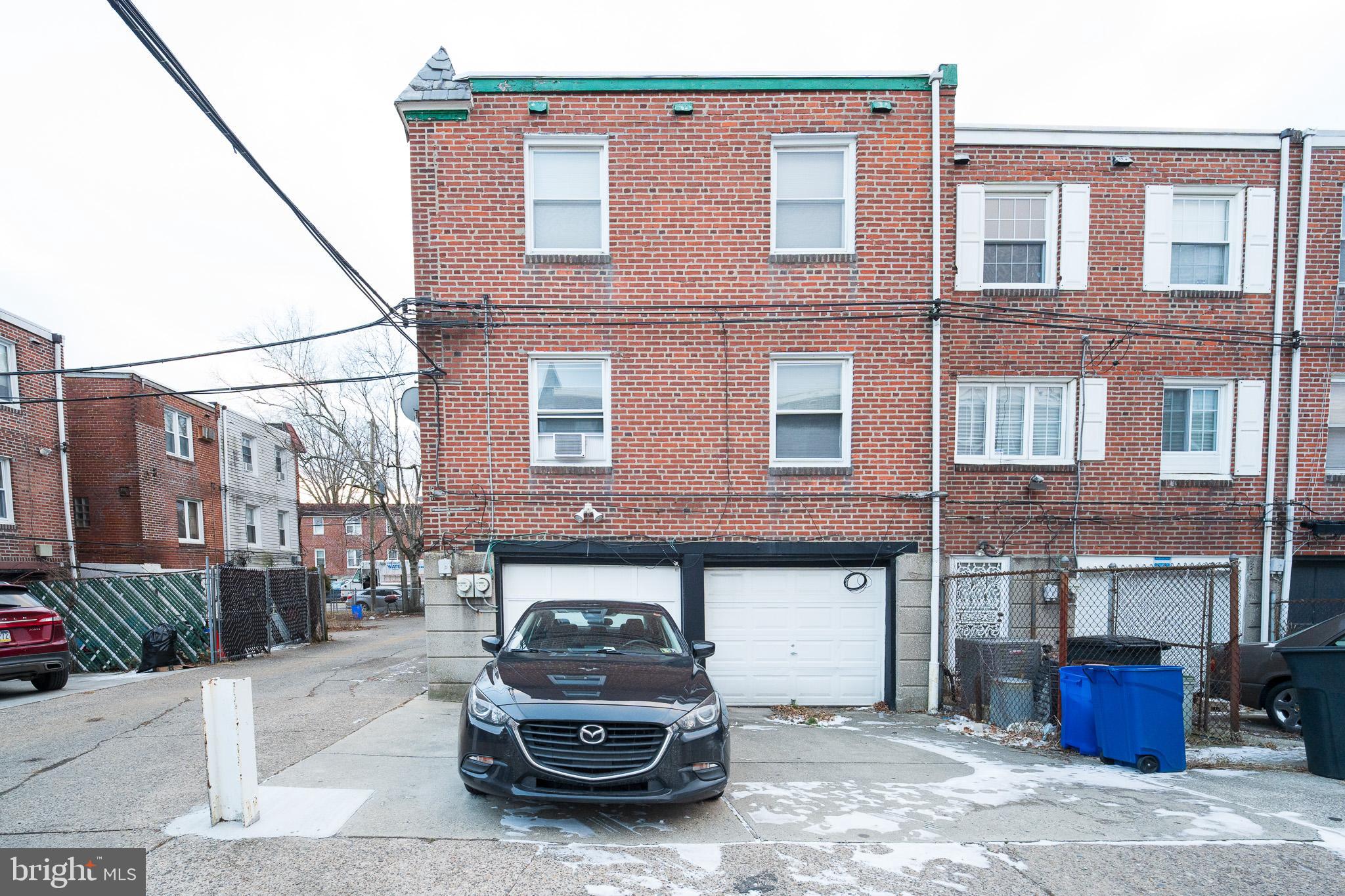 8207 Williams Avenue Philadelphia, PA 19150 - Photo 21 of 21 a car parked in front of a building