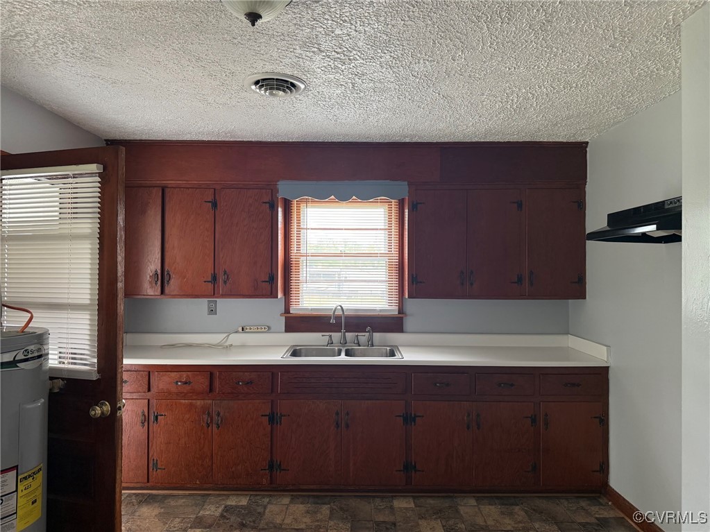1252 Columbia Road Columbia, VA 23038 - Photo 20 of 41 Kitchen featuring a sink, light countertops, water