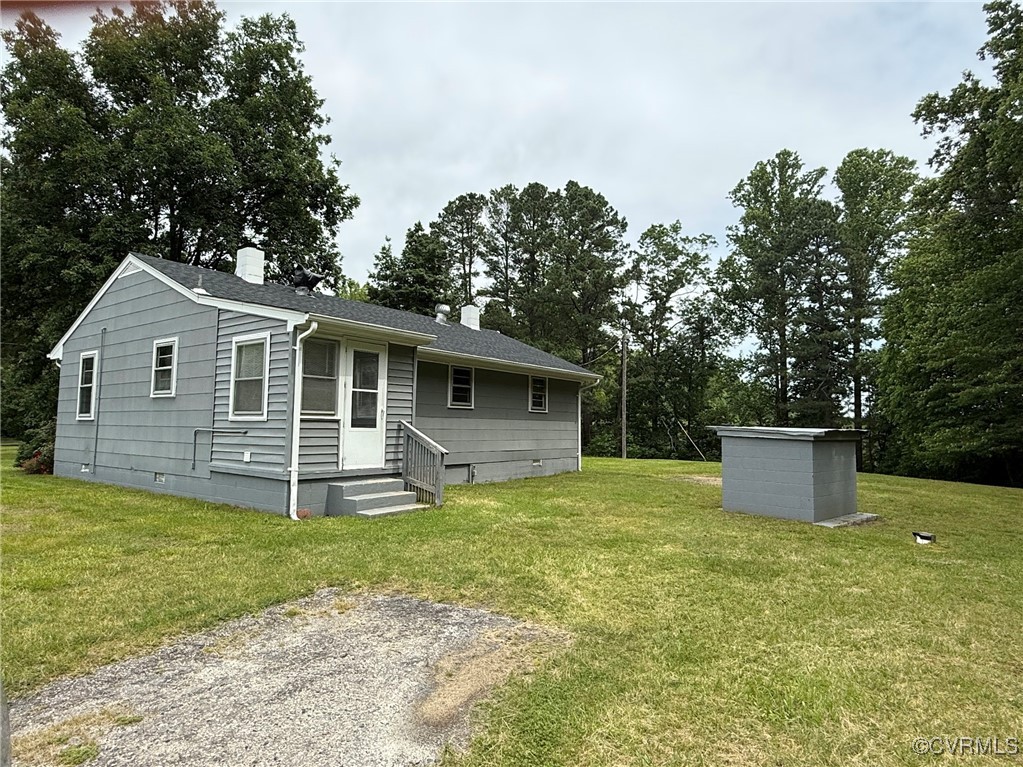1252 Columbia Road Columbia, VA 23038 - Photo 33 of 41 View of front of property featuring a chimney, a f