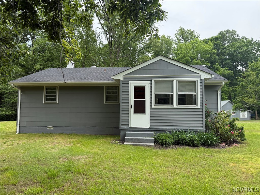 1252 Columbia Road Columbia, VA 23038 - Photo 6 of 41 Back of property with entry steps, a lawn, and a s