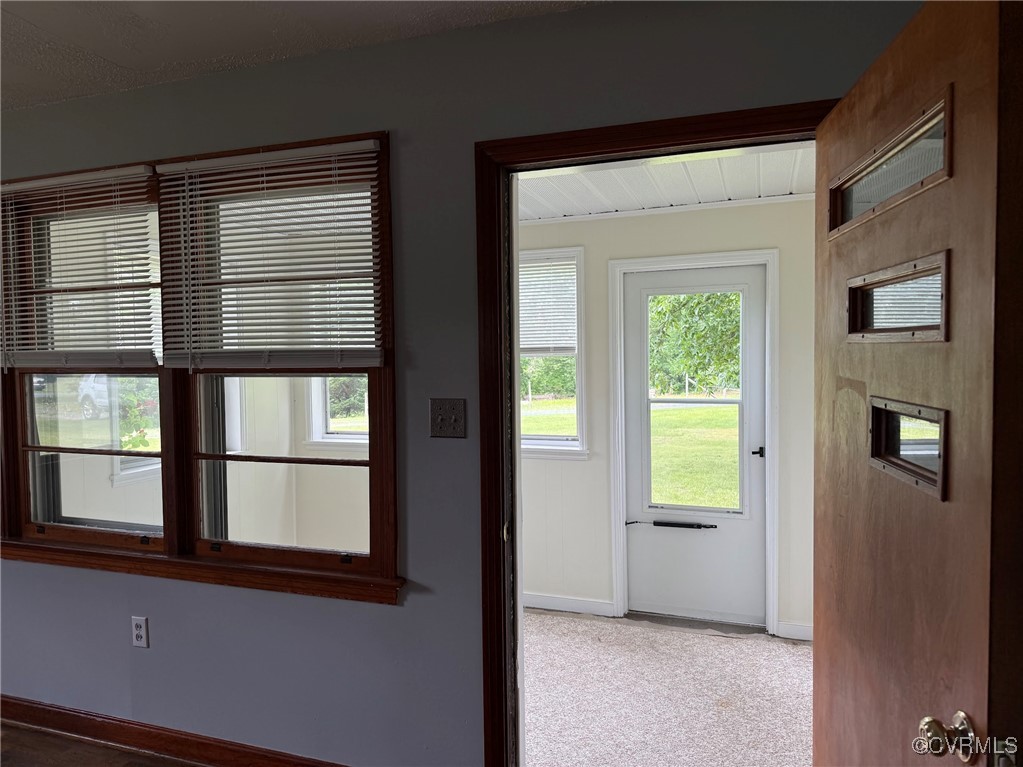 1252 Columbia Road Columbia, VA 23038 - Photo 10 of 41 Entryway through the sunroom into the living room