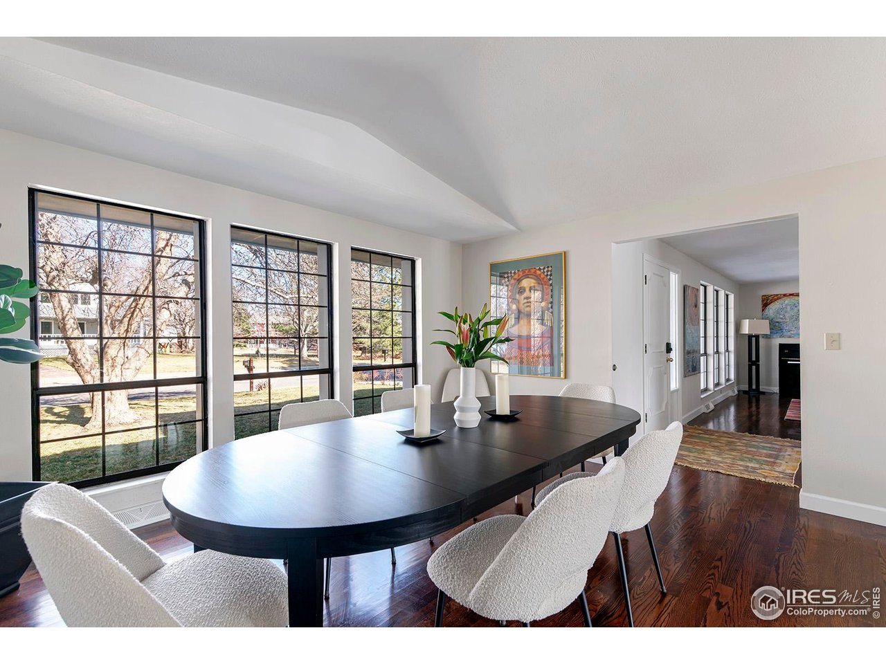 4556 Apple Way Boulder, CO 80301 - Photo 11 of 50 Dining room is a flexible space that would also be great as an office, playroom, yoga/meditation space or artist studio with ideal northern light through charming black framed windows to the front yard