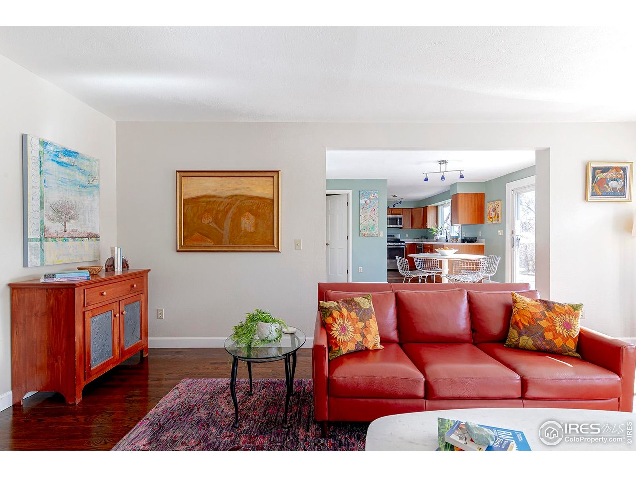 4556 Apple Way Boulder, CO 80301 - Photo 15 of 50 Living area flows to kitchen and eat-in kitchen dining area, all bathed in light from abundant south facing windows