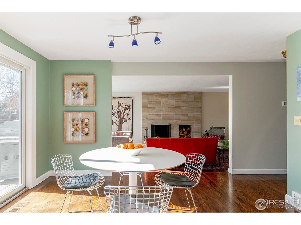 4556 Apple Way Boulder, CO 80301 - Photo 17 of 50 Light filled kitchen dining area flows to living area and kitchen and out to the south facing deck and yard