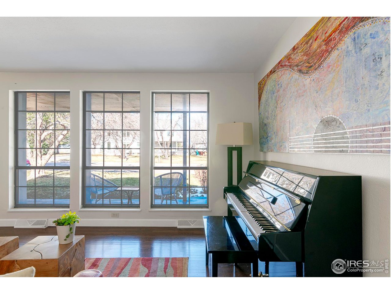 4556 Apple Way Boulder, CO 80301 - Photo 23 of 50 Music room flows from kitchen with nearby doors to garage and side yard