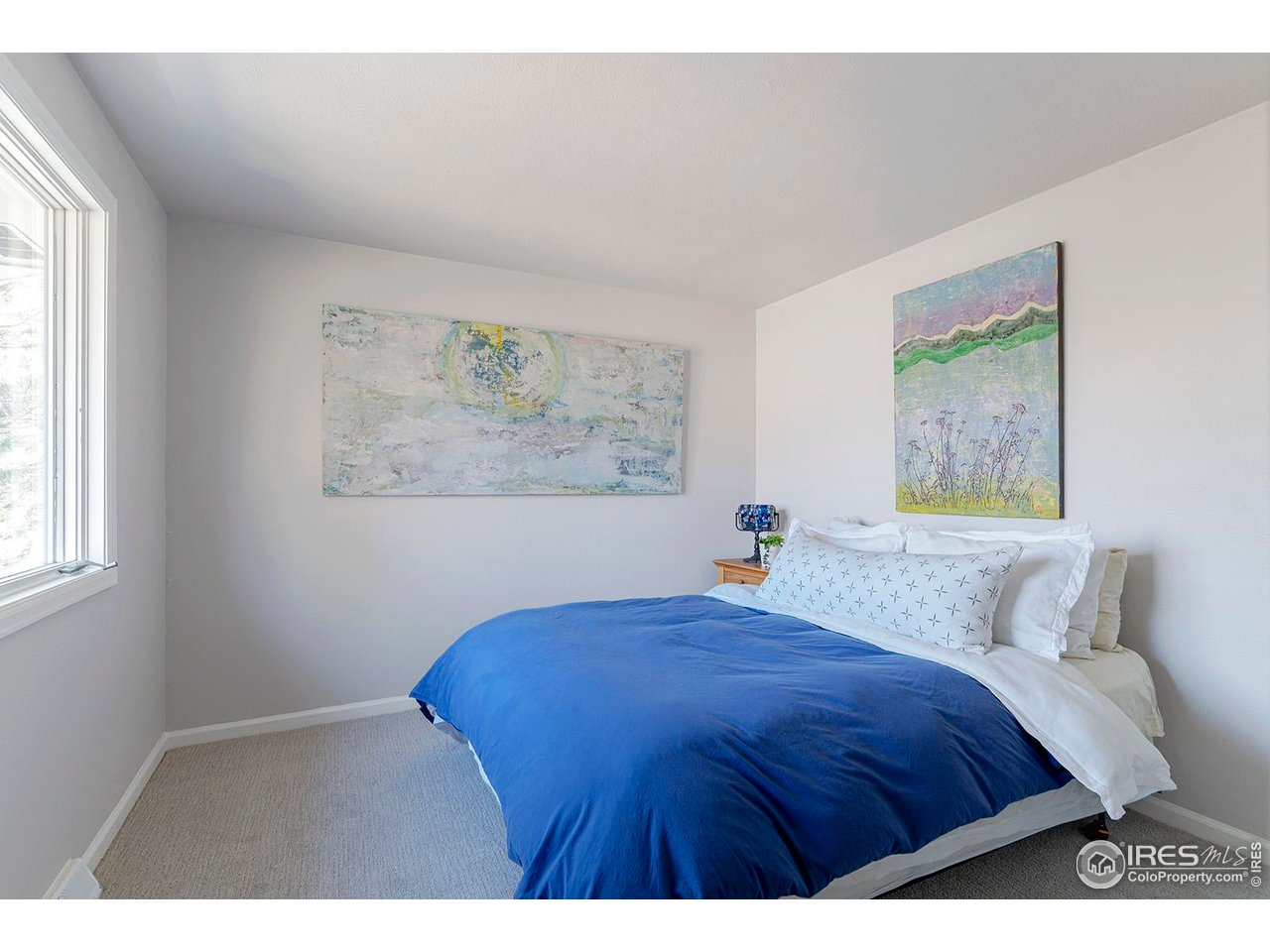 4556 Apple Way Boulder, CO 80301 - Photo 34 of 50 One of four bedrooms on the upper level. This one faces north to the front yard. Freshly painted with brand new carpet