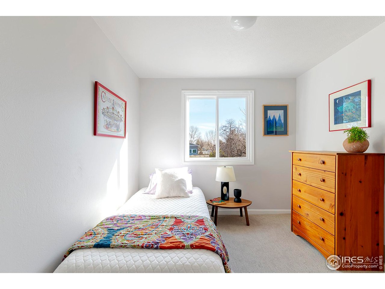 4556 Apple Way Boulder, CO 80301 - Photo 35 of 50 One of four bedrooms on the upper level. This one faces east to the side yard. Freshly painted with brand new carpet