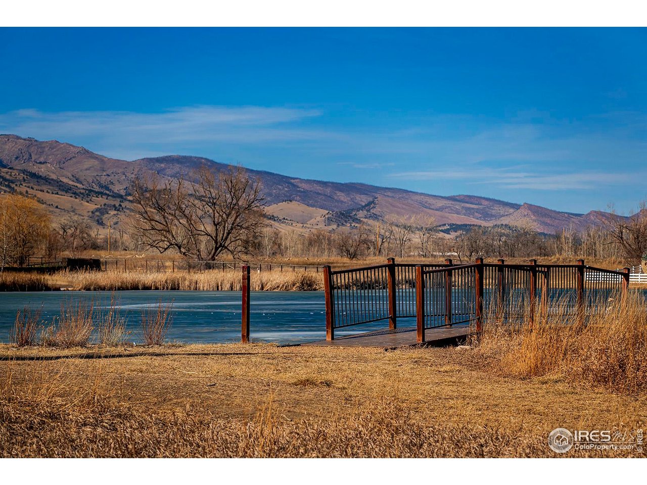 4556 Apple Way Boulder, CO 80301 - Photo 8 of 50 Bridge and pond surrounding by acres of nature preserve with views of nearby Foothills and access to miles of open space trails