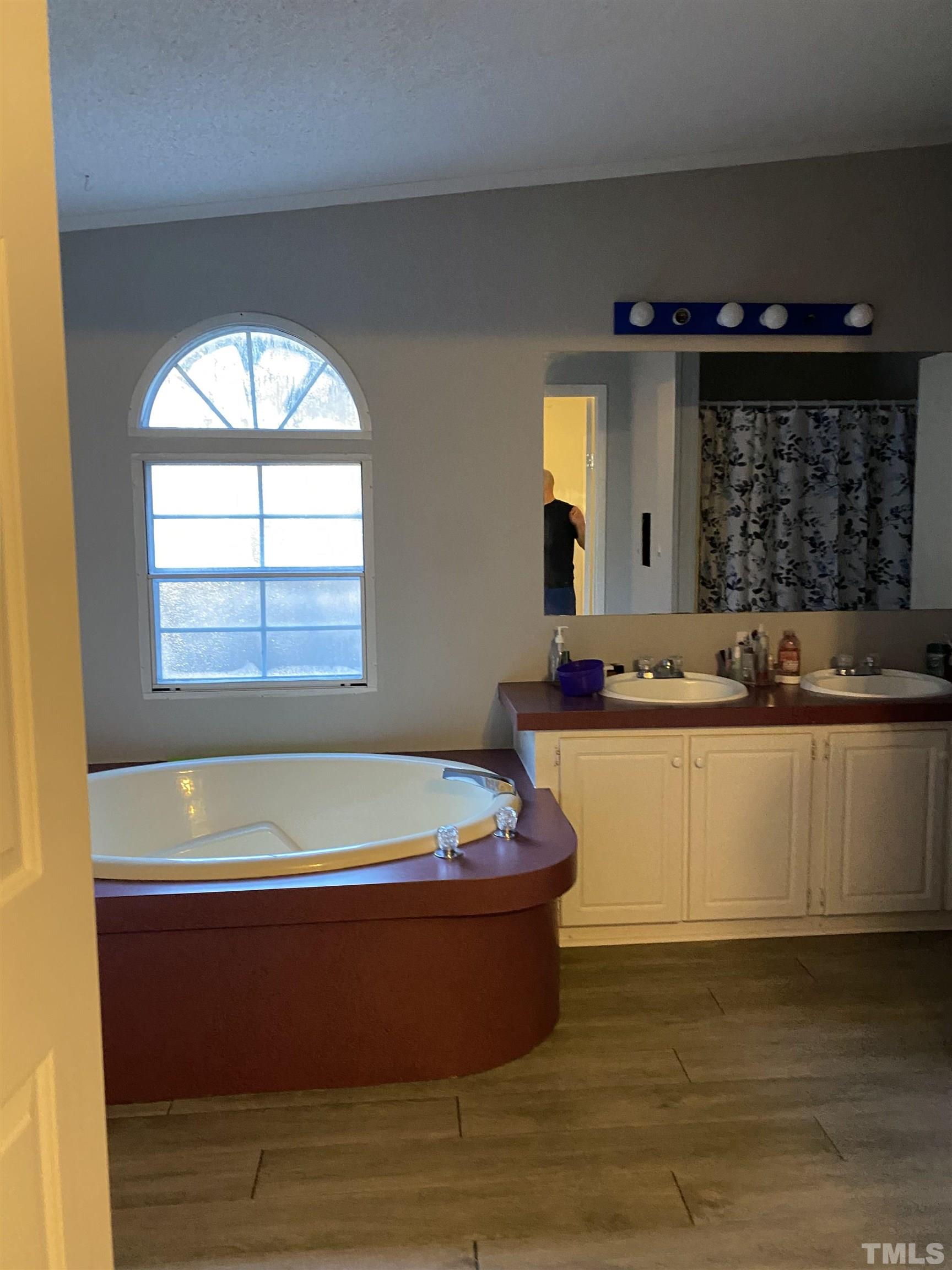 3546 Stagecoach Road Henderson, NC 27537 - Photo 5 of 5 a room with wooden floor and window