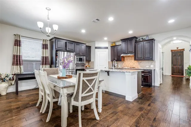 a view of a dining room with furniture