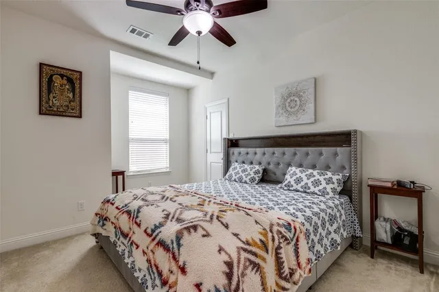 a bathroom with a double vanity sink toilet and shower