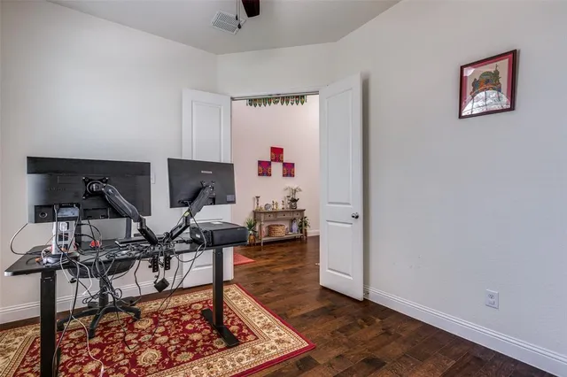 a living room with furniture and a rug