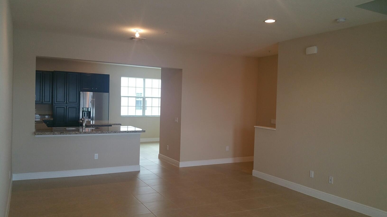 2825 Southwest 119th Way Miramar, FL 33025 - Photo 5 of 23 an empty room with wooden floor and a window