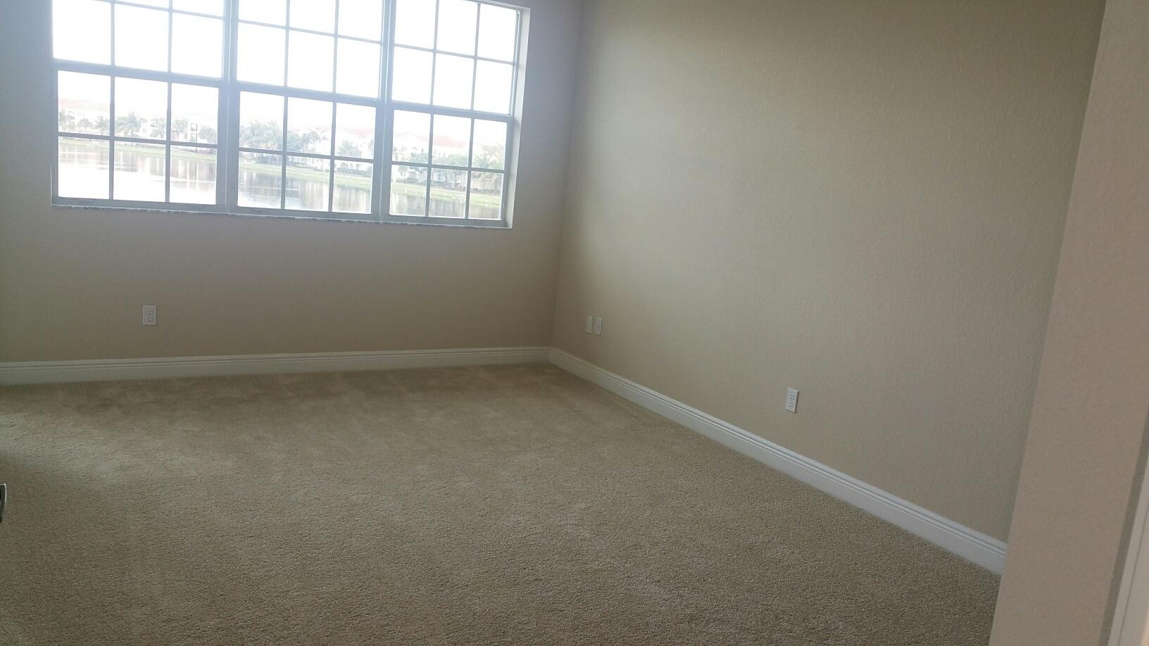 2825 Southwest 119th Way Miramar, FL 33025 - Photo 8 of 23 an empty room with a window