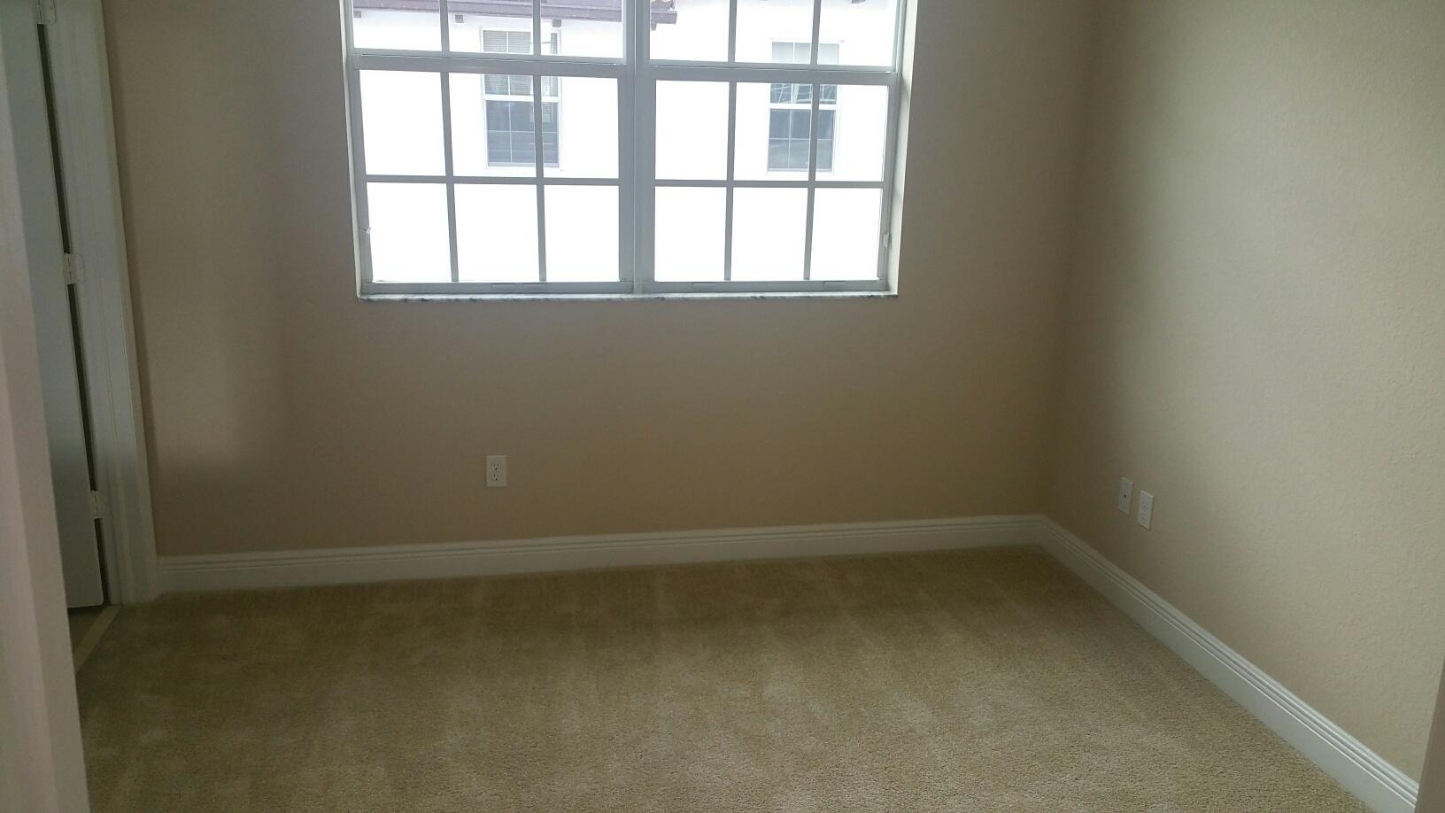 2825 Southwest 119th Way Miramar, FL 33025 - Photo 9 of 23 an empty room with a window