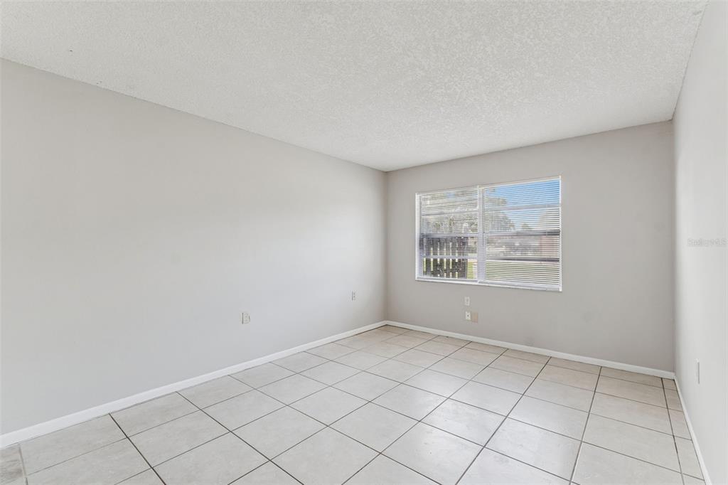 6024 Norton Road Lakeland, FL 33809 - Photo 31 of 56 an empty room with a window