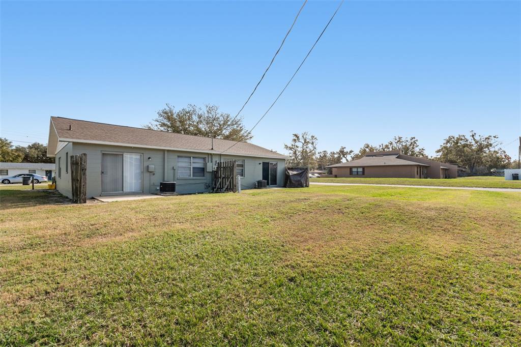 6024 Norton Road Lakeland, FL 33809 - Photo 39 of 56 a house with a swimming pool in front of it
