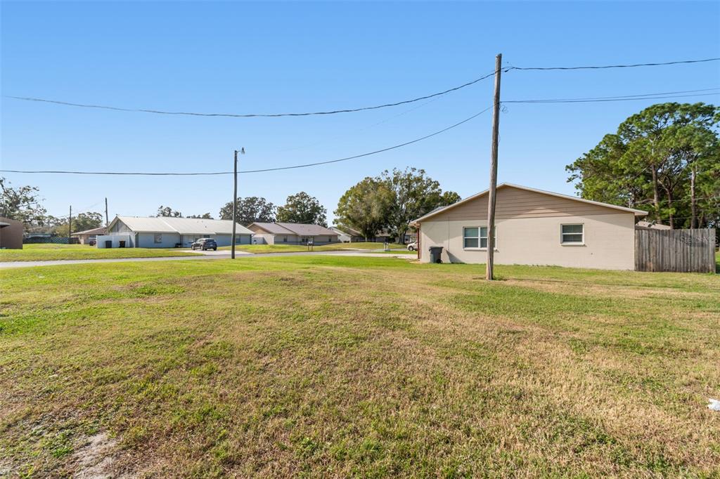 6024 Norton Road Lakeland, FL 33809 - Photo 40 of 56 a view of a house with a yard and sitting area
