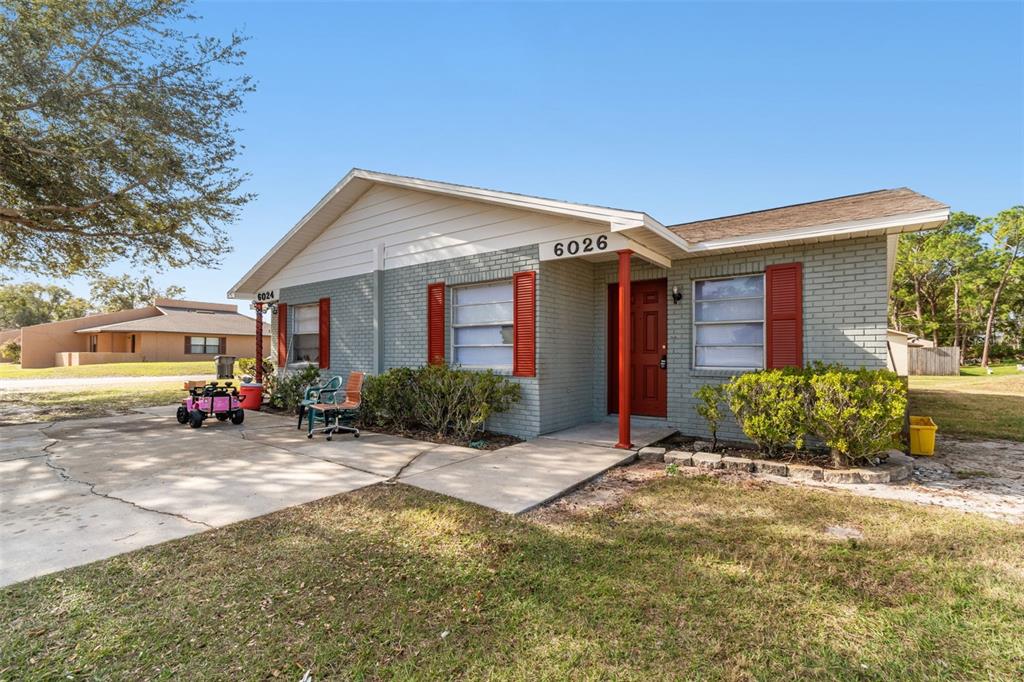 6024 Norton Road Lakeland, FL 33809 - Photo 5 of 56 a view of a house with backyard porch and sitting area