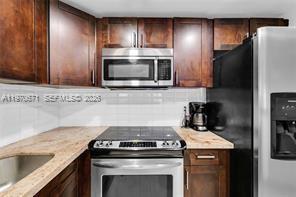 257 South Cypress Road, Unit 403 Pompano Beach, FL 33060 - Photo 5 of 24