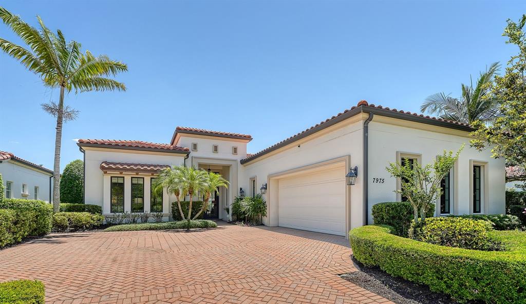 7975 Matera Court Lakewood Ranch, FL 34202 - Photo 12 of 83 front view of a house with a yard